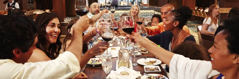People dining and making toast